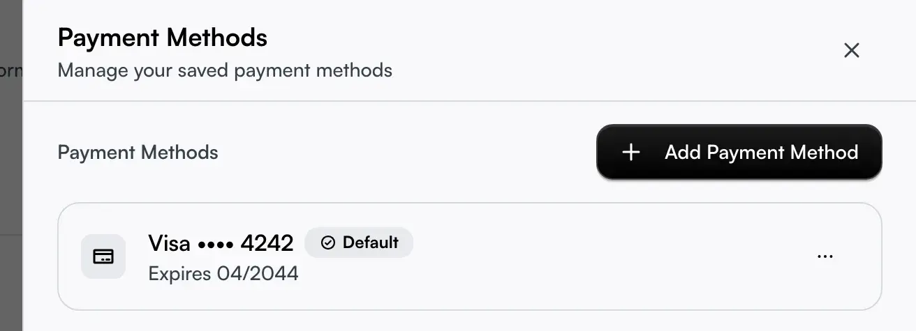 The Payment Methods drawer with a saved card, its Default badge, and the more menu