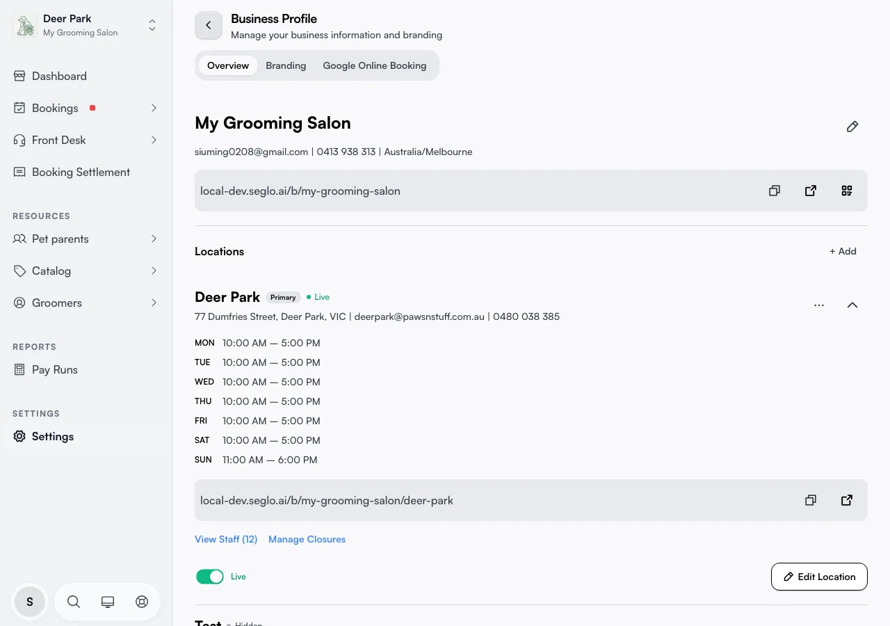 The Overview tab showing business name, contact details, the booking link with its copy, open, and QR buttons, and the primary location