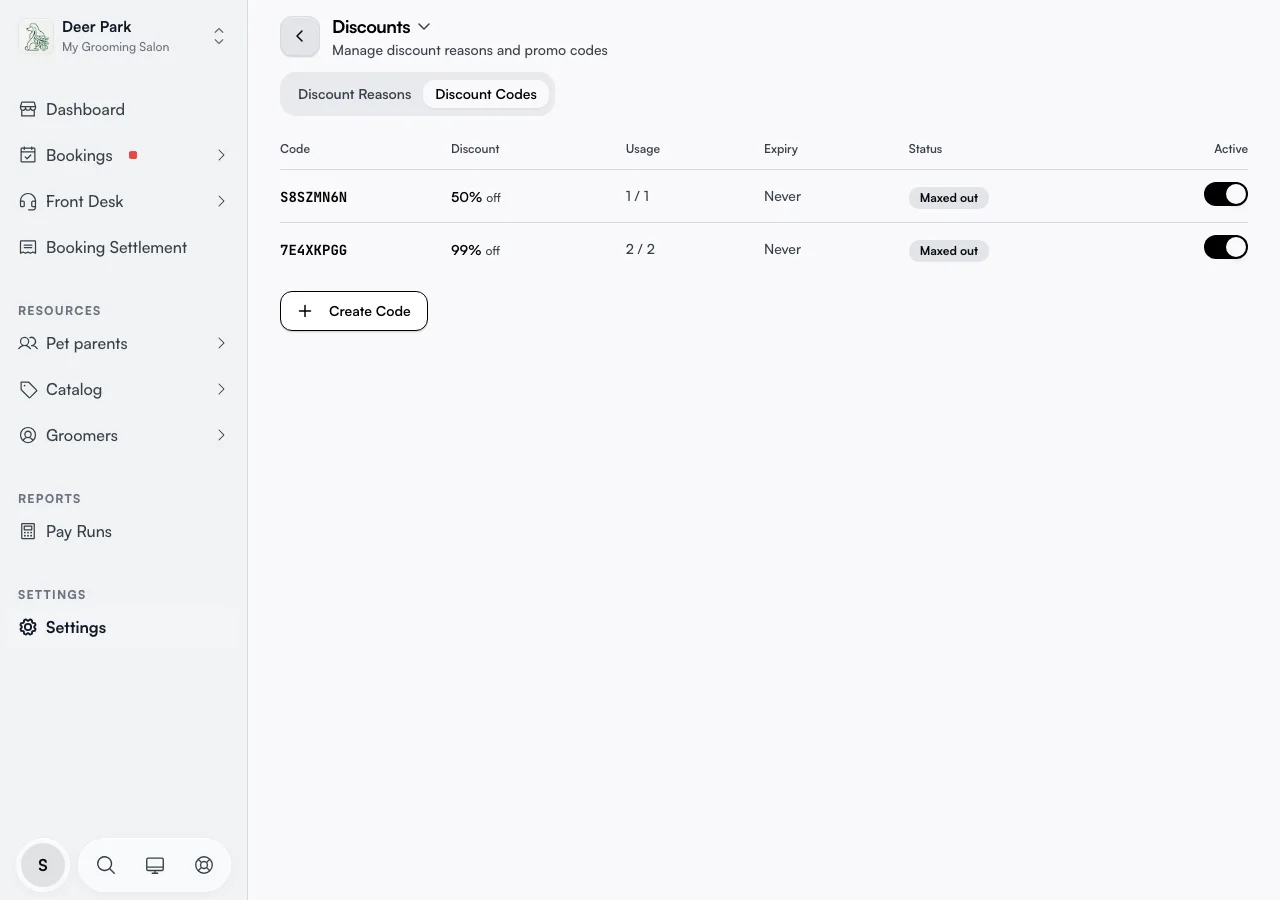 The Discount Codes tab table showing each code with its discount, usage, expiry, and status